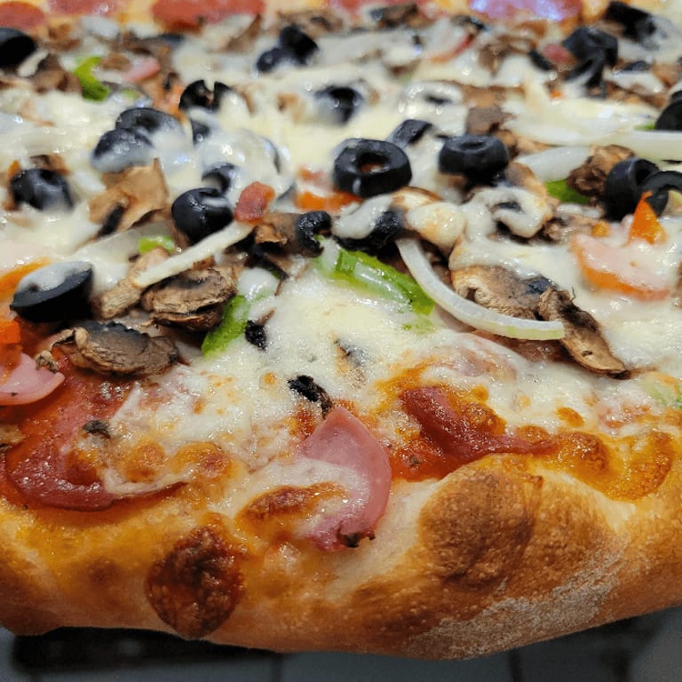 Indulge in Our Supreme Pizza